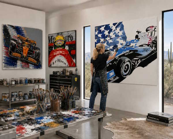 AI mockup of Anita Lewis painting abstract Formula 1 car art in her studio